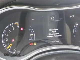 2018 Jeep Grand Cherokee Limited with VIN 1C4RJFBG0JC144620, listed as a IAAI auction lot 42018572 with 124,874 mi miles and . Bid and sale history available at DreamBid. Image 7.