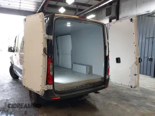 2023 Mercedes-Benz Sprinter Cargo Cargo with VIN W1Y40BHY5PT157048, listed as a IAAI auction lot 40339280 with 33,725 mi miles and . Bid and sale history available at DreamBid. Image 3.