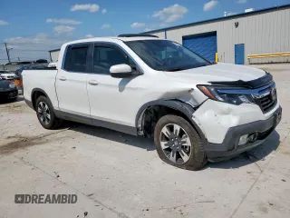 2020 Honda Ridgeline RTL with VIN 5FPYK3F57LB031244, listed as a Copart auction lot 58863795 with 54,318 mi miles and Salvage title. Bid and sale history available at DreamBid. Image 4.