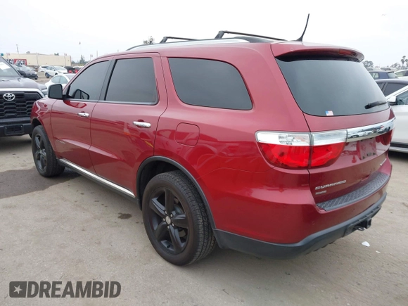 2013 Dodge Durango Citadel with VIN 1C4RDJEGXDC669937, listed as a IAAI auction lot 42105204 with 153,015 mi miles and . Bid and sale history available at DreamBid. Image 3.
