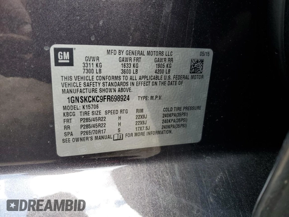 2015 Chevrolet Tahoe LTZ with VIN 1GNSKCKC9FR698924, listed as a Copart auction lot 56196895 with 184,740 mi miles and Salvage title. Bid and sale history available at DreamBid. Image 13.
