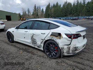 2023 Tesla Model 3 Performance with VIN 5YJ3E1EC0PF498509, listed as a Copart auction lot 50579835 with 32,327 mi miles and Salvage Title. Bid and sale history available at carsss.com. Image 2.