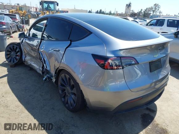 2024 Tesla Model Y Performance with VIN 7SAYGDEF9RA299036, listed as a IAAI auction lot 42140788 with 14,844 mi miles and . Bid and sale history available at DreamBid. Image 3.