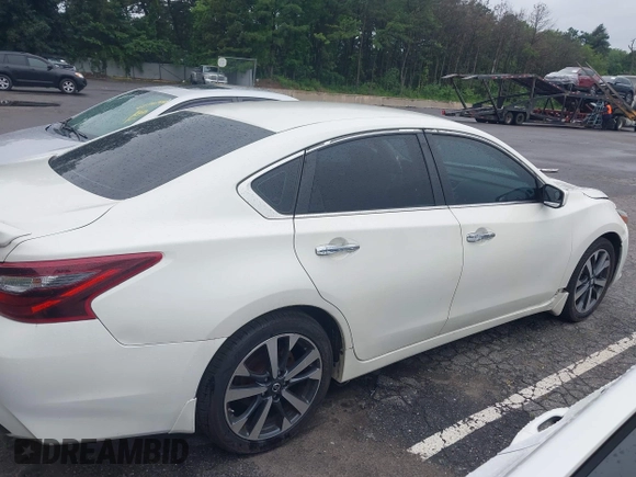 2017 Nissan Altima SR z VIN 1N4AL3AP3HC271465, wystawiony jako IAAI lot #42716097 z przebiegiem 159 349 mil mil oraz . Historia ofert i sprzedaży dostępna na DreamBid. Obrazek 13.