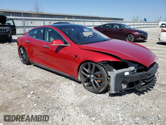 2014 Tesla Model S 60 with VIN 5YJSA1S12EFP65799, listed as a Copart auction lot 50895235 with 132,669 mi miles and Salvage Title. Bid and sale history available at DreamBid. Image 4.