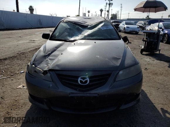 2005 Mazda 6 Sport S with VIN 1YVHP82D355M75191, listed as a Copart auction lot 61158974 with 153,808 mi miles and Salvage Title. Bid and sale history available at DreamBid. Image 5.