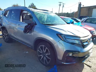 2019 Honda Pilot Touring 7-Passenger z VIN 5FNYF6H60KB038846, wystawiony jako IAAI lot #41339385 z przebiegiem Nie podano mil oraz . Historia ofert i sprzedaży dostępna na DreamBid. Obrazek 1.