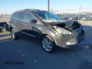 2013 Ford Escape SE with VIN 1FMCU9GX2DUC24504, listed as a IAAI auction lot 41846714 with 145,333 mi miles. Bid and sale history available at carsss.com. Image 1.