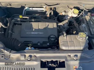 2015 Chevrolet Trax LS z VIN KL7CJKSB3FB095443, wystawiony jako Copart lot #90010525 z przebiegiem 139 699 mil mil oraz Czysty tytuł • Clean title. Historia ofert i sprzedaży dostępna na DreamBid. Obrazek 11.