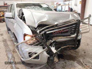 2015 GMC Canyon 4WD SLE with VIN 1GTG6BE36F1124627, listed as a IAAI auction lot 41623806 with 104,182 mi miles and . Bid and sale history available at carsss.com. Image 6.