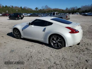 2014 Nissan 370Z Touring with VIN JN1AZ4EH1EM635411, listed as a Copart auction lot 82670344 with 77,501 mi miles and Salvage Title. Bid and sale history available at carsss.com. Image 2.