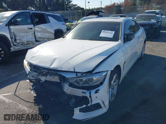 2014 BMW 4 Series 428i xDrive with VIN WBA3N5C56EF716566, listed as a IAAI auction lot 41245322 with 72,252 mi miles and . Bid and sale history available at DreamBid. Image 2.