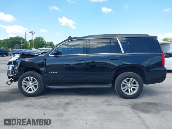 2019 Chevrolet Tahoe LT z VIN 1GNSKBKC1KR200476, wystawiony jako IAAI lot #41897702 z przebiegiem 136 432 mil mil oraz . Historia ofert i sprzedaży dostępna na DreamBid. Obrazek 14.