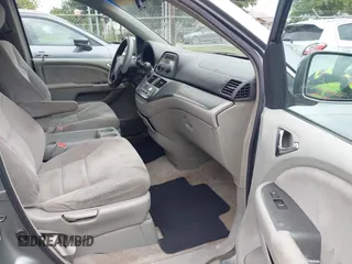 2005 Honda Odyssey EX with VIN 5FNRL38415B104920, listed as a IAAI auction lot 42094690 with 228,538 mi miles. Bid and sale history available at carsss.com. Image 5.