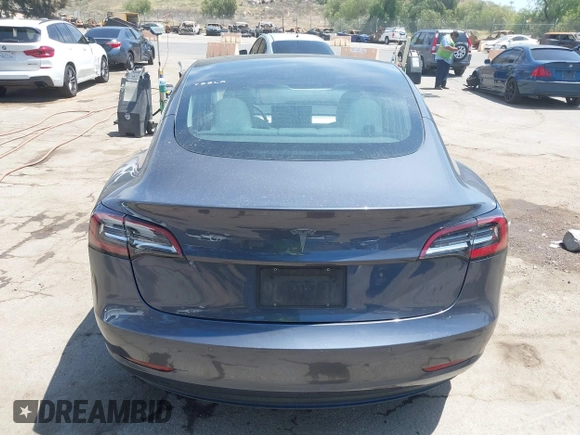 2020 Tesla Model 3 Standard Range Plus with VIN 5YJ3E1EAXLF615781, listed as a IAAI auction lot 42068935 with 96,026 mi miles. Bid and sale history available at carsss.com. Image 16.