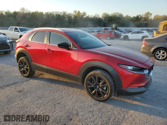 2022 Mazda CX-30 2.5 Turbo with VIN 3MVDMBAYXNM437805, listed as a Copart auction lot 74371364 with 22,533 mi miles and Clean Title. Bid and sale history available at DreamBid. Image 4.