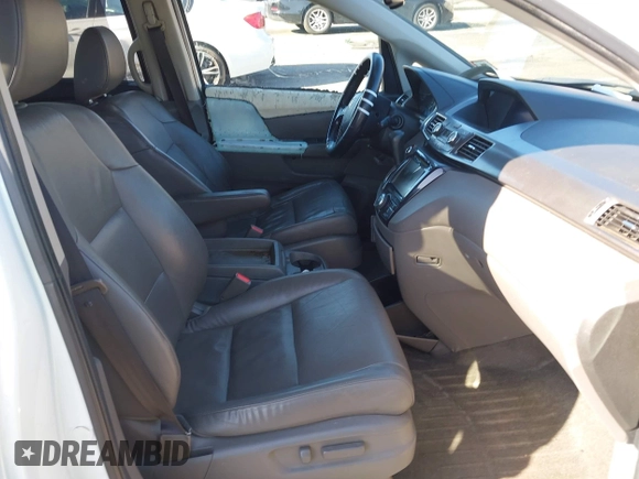 2014 Honda Odyssey EX-L with VIN 5FNRL5H65EB012528, listed as a IAAI auction lot 41951424 with 161,832 mi miles and . Bid and sale history available at DreamBid. Image 5.
