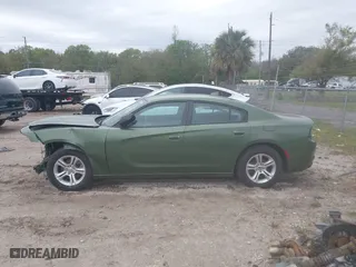 2023 Dodge Charger SXT with VIN 2C3CDXBG8PH608380, listed as a IAAI auction lot 41649203 with 26,450 mi miles. Bid and sale history available at carsss.com. Image 14.