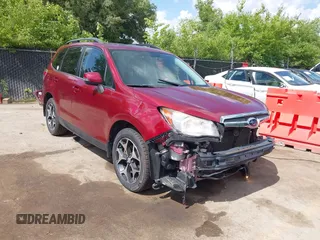 2014 Subaru Forester XT Touring with VIN JF2SJGMC9EH552996, listed as a IAAI auction lot 42540898 with 145,932 mi miles and . Bid and sale history available at DreamBid. Image 1.