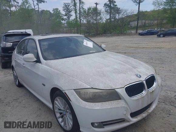 2011 BMW 3 Series 335i with VIN WBAPM5C51BE575704, listed as a IAAI auction lot 42005354 with 205,263 mi miles. Bid and sale history available at carsss.com. Image 1.