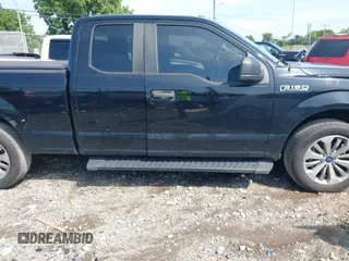 2018 Ford F-150 XL with VIN 1FTEX1CPXJKE63642, listed as a IAAI auction lot 42768090 with 147,219 mi miles and . Bid and sale history available at DreamBid. Image 13.