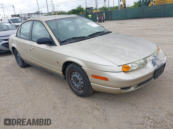 2002 Saturn SL z VIN 1G8ZK52732Z131361, wystawiony jako IAAI lot #42358215 z przebiegiem 228 184 mil mil oraz . Historia ofert i sprzedaży dostępna na DreamBid. Obrazek 1.