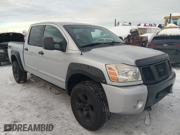 2005 Nissan Titan SE with VIN 1N6BA07B15N535701, listed as a Copart auction lot 46502565 with 180,923 mi miles and Salvage Title. Bid and sale history available at DreamBid. Image 4.