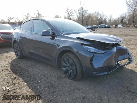2025 Tesla Model Y Long Range with VIN 7SAYGDEE4SF291068, listed as a Copart auction lot 51204615 with 2,958 mi miles and Salvage Title. Bid and sale history available at DreamBid. Image 4.
