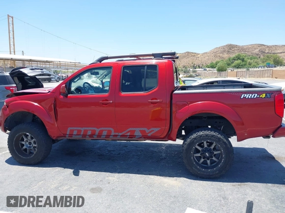 2015 Nissan Frontier SL with VIN 1N6AD0EV1FN711521, listed as a IAAI auction lot 42525352 with 203,114 mi miles and . Bid and sale history available at DreamBid. Image 14.