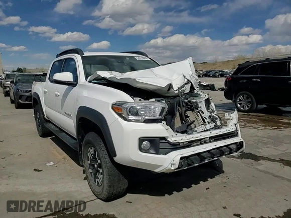 2018 Toyota Tacoma SR with VIN 5TFCZ5AN3JX128204, listed as a Copart auction lot 53970865 with 76,986 mi miles and Salvage Title. Bid and sale history available at DreamBid. Image 14.