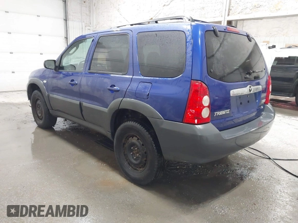 2006 Mazda Tribute i with VIN 4F2YZ92Z16KM37284, listed as a IAAI auction lot 41755952 with 129,284 mi miles and . Bid and sale history available at carsss.com. Image 3.