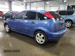 2004 Ford Focus ZX5 with VIN 3FAFP37354R102932, listed as a Copart auction lot 78814004 with 203,087 mi miles and Salvage title. Bid and sale history available at DreamBid. Image 2.