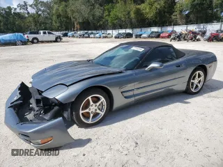 2004 Chevrolet Corvette with VIN 1G1YY32G945124387, listed as a Copart auction lot 77113234 with 59,985 mi miles and Salvage Title. Bid and sale history available at carsss.com. Image 1.