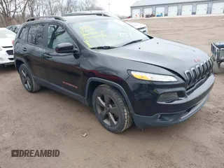 2016 Jeep Cherokee Latitude with VIN 1C4PJLCB1GW256777, listed as a IAAI auction lot 41150466 with 133,000 mi miles. Bid and sale history available at carsss.com. Image 1.