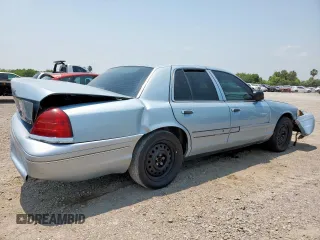 2004 Ford Crown Victoria LX z VIN 2FAFP74W54X184815, wystawiony jako Copart lot #57280725 z przebiegiem 294 513 mil mil oraz Szkoda całkowita • Salvage title. Historia ofert i sprzedaży dostępna na DreamBid. Obrazek 3.