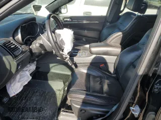 2019 Jeep Grand Cherokee Trailhawk with VIN 1C4RJFLG6KC838275, listed as a Copart auction lot 53002185 with 77,597 mi miles and Salvage title. Bid and sale history available at DreamBid. Image 7.
