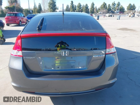 2010 Honda Insight LX with VIN JHMZE2H50AS019740, listed as a IAAI auction lot 41665527 with 74,022 mi miles and . Bid and sale history available at DreamBid. Image 16.
