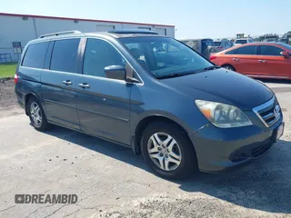 2006 Honda Odyssey EX-L z VIN 5FNRL38776B451681, wystawiony jako IAAI lot #42738775 z przebiegiem 128 977 mil mil oraz . Historia ofert i sprzedaży dostępna na DreamBid. Obrazek 1.
