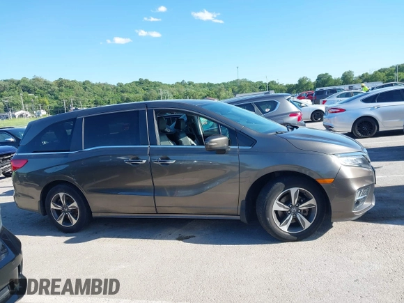 2018 Honda Odyssey Touring с VIN 5FNRL6H80JB010624, выставлен на аукционе IAAI как лот 42306968 с пробегом 107 749 миль миль и . История ставок и продаж доступна на DreamBid. Изображение 13.