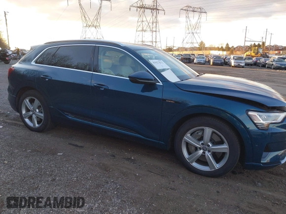 2019 Audi e-tron Prestige with VIN WA1VABGE0KB011579, listed as a IAAI auction lot 41027812 with 41,549 mi miles and . Bid and sale history available at DreamBid. Image 1.