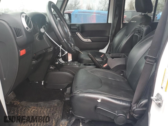 2015 Jeep Wrangler Unlimited Rubicon Hard Rock с VIN 1C4HJWFG8FL647910, выставлен на аукционе Copart как лот 46716605 с пробегом 48 139 миль миль и Списание • Salvage title. История ставок и продаж доступна на DreamBid. Изображение 7.