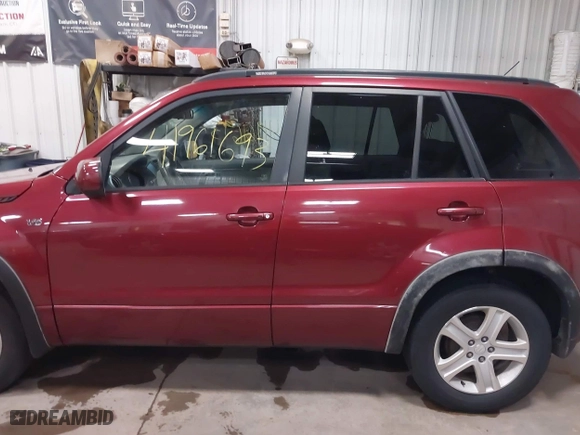 2006 Suzuki Grand Vitara Luxury with VIN JS3TD947264106126, listed as a IAAI auction lot 41961693 with 146,105 mi miles. Bid and sale history available at carsss.com. Image 14.