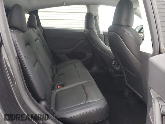 2024 Tesla Model Y with VIN 7SAYGDED4RF017614, listed as a Copart auction lot 45754675 with 11,209 mi miles and Salvage title. Bid and sale history available at DreamBid. Image 11.