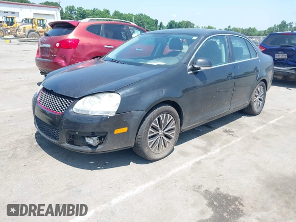 2009 Volkswagen Jetta SE with VIN 3VWRM71K79M166916, listed as a IAAI auction lot 42400659 with 166,061 mi miles and . Bid and sale history available at DreamBid. Image 2.