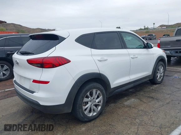 2019 Hyundai Tucson SE with VIN KM8J23A48KU026984, listed as a IAAI auction lot 41767118 with 72,647 mi miles. Bid and sale history available at carsss.com. Image 4.