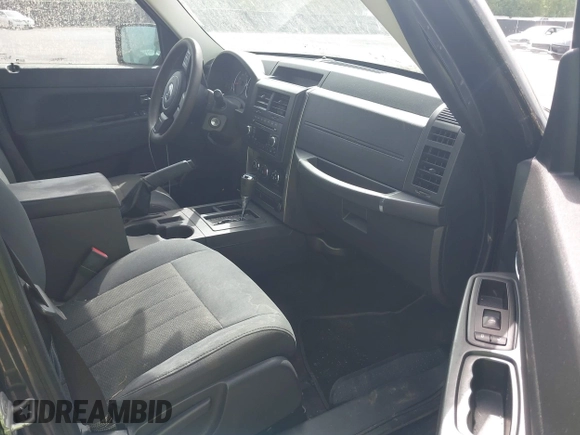 2011 Jeep Liberty Sport with VIN 1J4PP2GK8BW580217, listed as a IAAI auction lot 42046477 with 240,189 mi miles. Bid and sale history available at carsss.com. Image 5.
