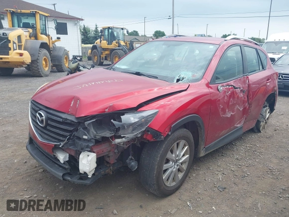 2016 Mazda CX-5 Sport with VIN JM3KE4BY3G0635882, listed as a IAAI auction lot 42545799 with 144,247 mi miles and . Bid and sale history available at DreamBid. Image 17.