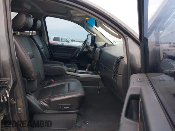 2010 Nissan Titan Pro-4X with VIN 1N6BA0EC9AN323943, listed as a IAAI auction lot 42795482 with 200,453 mi miles and . Bid and sale history available at DreamBid. Image 5.