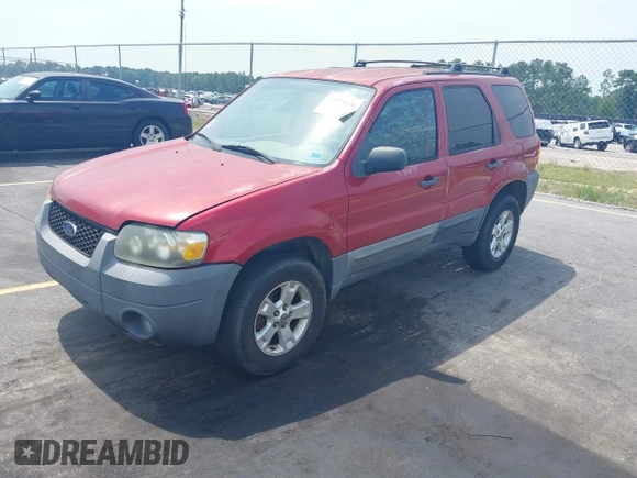 2006 Ford Escape XLT with VIN 1FMYU03136KD09448, listed as a IAAI auction lot 42578120 with 235,521 mi miles and . Bid and sale history available at DreamBid. Image 2.