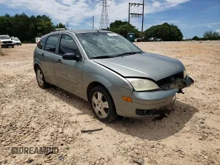 2006 Ford Focus S with VIN 1FAHP37N76W180039, listed as a Copart auction lot 58328565 with 220,696 mi miles and Salvage title. Bid and sale history available at DreamBid. Image 15.